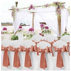 34 Elegant Cream Satin Chair Covers with 50 rose gold Sashes